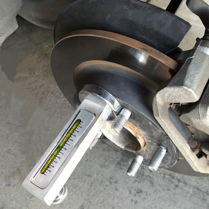 Automotive wheel alignment magnetic level
