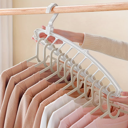 Eleven-hole multi-functional rotating clothes hanger